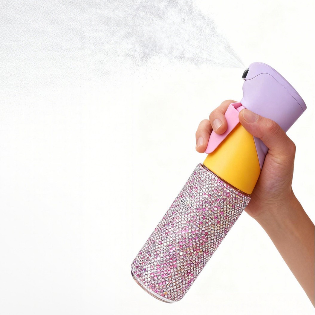 Spray bottle components — assembled continuous spray bottle showing all external parts